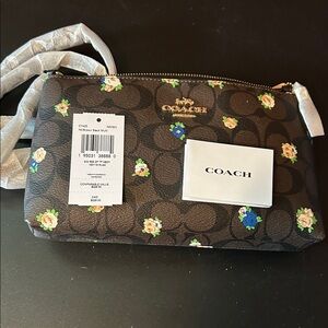 Coach Brown Crossbody Bag with Floral Accents